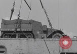 Image of M3 half-track hoisted to LST Southampton England, 1944, second 47 stock footage video 65675079387