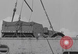 Image of M3 half-track hoisted to LST Southampton England, 1944, second 48 stock footage video 65675079387