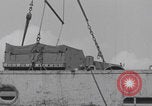 Image of M3 half-track hoisted to LST Southampton England, 1944, second 49 stock footage video 65675079387