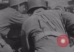 Image of Free French fire 105 mm Howitzer Motor Carriage M7 Luce France, 1944, second 9 stock footage video 65675079388