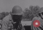Image of Free French fire 105 mm Howitzer Motor Carriage M7 Luce France, 1944, second 17 stock footage video 65675079388