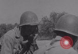 Image of Free French fire 105 mm Howitzer Motor Carriage M7 Luce France, 1944, second 18 stock footage video 65675079388