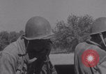 Image of Free French fire 105 mm Howitzer Motor Carriage M7 Luce France, 1944, second 19 stock footage video 65675079388