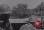 Image of Free French fire 105 mm Howitzer Motor Carriage M7 Luce France, 1944, second 20 stock footage video 65675079388