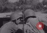 Image of Free French fire 105 mm Howitzer Motor Carriage M7 Luce France, 1944, second 21 stock footage video 65675079388