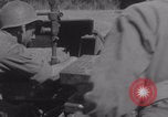 Image of Free French fire 105 mm Howitzer Motor Carriage M7 Luce France, 1944, second 22 stock footage video 65675079388
