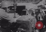 Image of Free French fire 105 mm Howitzer Motor Carriage M7 Luce France, 1944, second 23 stock footage video 65675079388