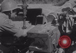 Image of Free French fire 105 mm Howitzer Motor Carriage M7 Luce France, 1944, second 24 stock footage video 65675079388