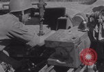 Image of Free French fire 105 mm Howitzer Motor Carriage M7 Luce France, 1944, second 31 stock footage video 65675079388