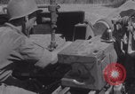 Image of Free French fire 105 mm Howitzer Motor Carriage M7 Luce France, 1944, second 35 stock footage video 65675079388