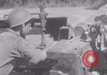 Image of Free French fire 105 mm Howitzer Motor Carriage M7 Luce France, 1944, second 36 stock footage video 65675079388