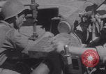 Image of Free French fire 105 mm Howitzer Motor Carriage M7 Luce France, 1944, second 38 stock footage video 65675079388