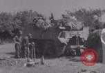 Image of Free French fire 105 mm Howitzer Motor Carriage M7 Luce France, 1944, second 41 stock footage video 65675079388