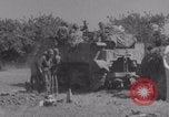 Image of Free French fire 105 mm Howitzer Motor Carriage M7 Luce France, 1944, second 42 stock footage video 65675079388