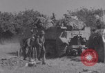Image of Free French fire 105 mm Howitzer Motor Carriage M7 Luce France, 1944, second 43 stock footage video 65675079388