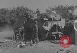 Image of Free French fire 105 mm Howitzer Motor Carriage M7 Luce France, 1944, second 44 stock footage video 65675079388