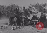 Image of Free French fire 105 mm Howitzer Motor Carriage M7 Luce France, 1944, second 45 stock footage video 65675079388