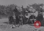 Image of Free French fire 105 mm Howitzer Motor Carriage M7 Luce France, 1944, second 46 stock footage video 65675079388