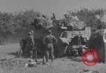 Image of Free French fire 105 mm Howitzer Motor Carriage M7 Luce France, 1944, second 47 stock footage video 65675079388