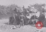 Image of Free French fire 105 mm Howitzer Motor Carriage M7 Luce France, 1944, second 48 stock footage video 65675079388