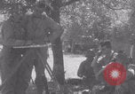 Image of Free French fire 105 mm Howitzer Motor Carriage M7 Luce France, 1944, second 50 stock footage video 65675079388