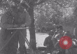 Image of Free French fire 105 mm Howitzer Motor Carriage M7 Luce France, 1944, second 52 stock footage video 65675079388