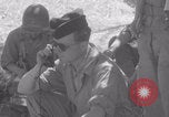 Image of Free French fire 105 mm Howitzer Motor Carriage M7 Luce France, 1944, second 55 stock footage video 65675079388