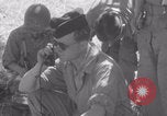 Image of Free French fire 105 mm Howitzer Motor Carriage M7 Luce France, 1944, second 57 stock footage video 65675079388