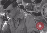 Image of Free French fire 105 mm Howitzer Motor Carriage M7 Luce France, 1944, second 60 stock footage video 65675079388