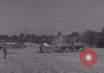 Image of Free French 2nd Armored Division fire M7s Luce France, 1944, second 54 stock footage video 65675079389