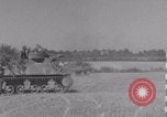 Image of Free French 2nd Armored Division fire M7s Luce France, 1944, second 55 stock footage video 65675079389