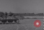 Image of Free French 2nd Armored Division fire M7s Luce France, 1944, second 56 stock footage video 65675079389