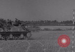 Image of Free French 2nd Armored Division fire M7s Luce France, 1944, second 59 stock footage video 65675079389