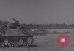 Image of Free French 2nd Armored Division fire M7s Luce France, 1944, second 62 stock footage video 65675079389