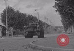 Image of M4 Sherman tank fires in street WW2 Antony France, 1944, second 38 stock footage video 65675079398
