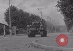 Image of M4 Sherman tank fires in street WW2 Antony France, 1944, second 41 stock footage video 65675079398