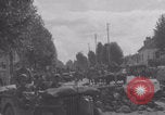 Image of M4 Sherman tank fires in street WW2 Antony France, 1944, second 46 stock footage video 65675079398