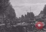Image of M4 Sherman tank fires in street WW2 Antony France, 1944, second 47 stock footage video 65675079398