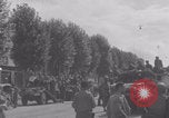 Image of M4 Sherman tank fires in street WW2 Antony France, 1944, second 51 stock footage video 65675079398