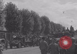 Image of M4 Sherman tank fires in street WW2 Antony France, 1944, second 52 stock footage video 65675079398