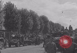 Image of M4 Sherman tank fires in street WW2 Antony France, 1944, second 53 stock footage video 65675079398