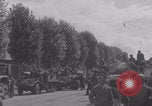 Image of M4 Sherman tank fires in street WW2 Antony France, 1944, second 54 stock footage video 65675079398