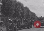 Image of M4 Sherman tank fires in street WW2 Antony France, 1944, second 58 stock footage video 65675079398
