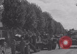 Image of M4 Sherman tank fires in street WW2 Antony France, 1944, second 59 stock footage video 65675079398
