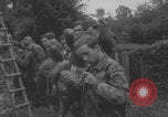 Image of German prisoners searched in Normandy Normandy France, 1944, second 49 stock footage video 65675079414