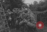 Image of German prisoners searched in Normandy Normandy France, 1944, second 50 stock footage video 65675079414