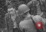 Image of German prisoners searched in Normandy Normandy France, 1944, second 62 stock footage video 65675079414