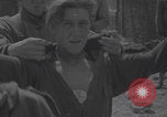 Image of German prisoners searched Periers France, 1944, second 9 stock footage video 65675079417