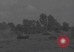 Image of United States troops and tanks advance Dombasle France, 1944, second 33 stock footage video 65675079419