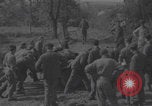 Image of German prisoners digging graves Normandy Dompaire France, 1944, second 18 stock footage video 65675079421